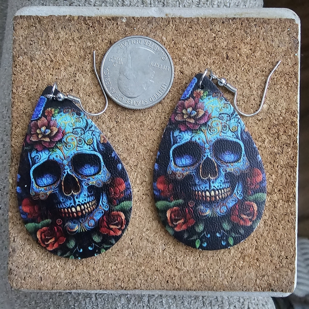 Skull Dangle Earrings New in Package